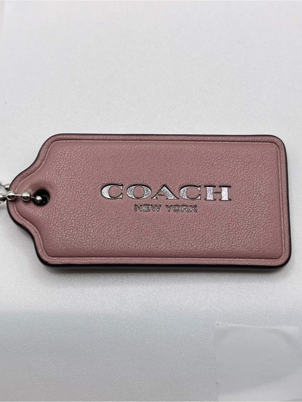 Coach Mauve/Rose Leather Hang Tag Keychain